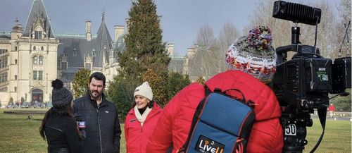 Producer Andrew Gernhard and being interviewed during media day on the set of Hallmark’s “A Biltmore Christmas” (2023).