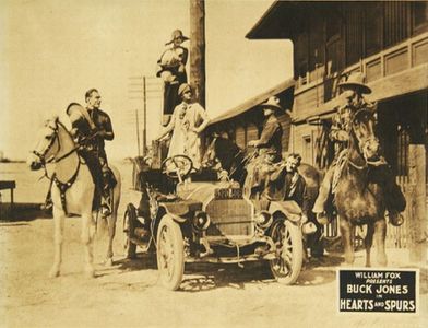 Carole Lombard, J. Gordon Russell, Buck Jones, Lucien Littlefield, and Walt Robbins in Hearts and Spurs (1925)