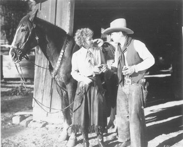 Rex Lease, Mabel Strickland, and Sunday in Rough Riding Ranger (1935)