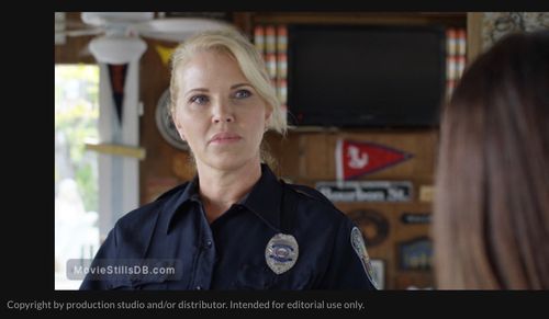 Carole Wood as Officer Trimani in 