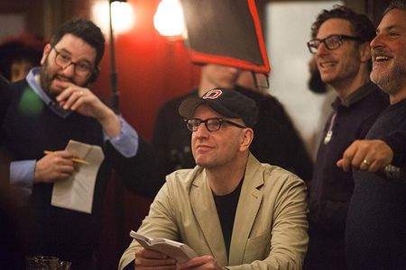 Jack Amiel, Steven Soderbergh, Michael Begler, and Greg Jacobs watch a rehearsal on the set of The Knick