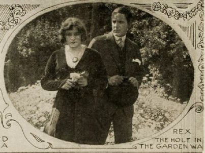 Rupert Julian and Elsie Jane Wilson in The Hole in the Garden Wall (1914)