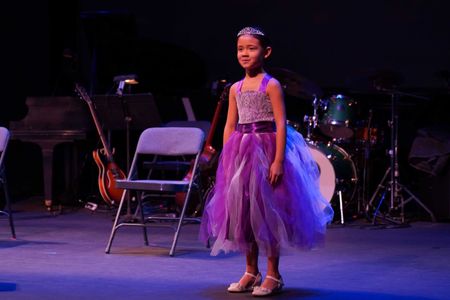 Araceli Prasarttongosoth performing at EWP Night Market