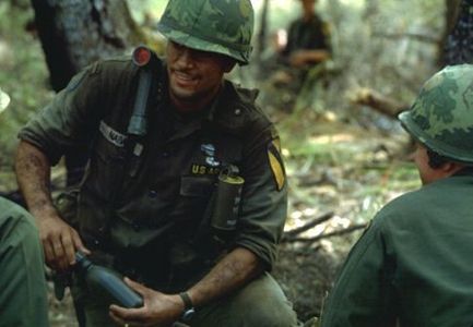 Jsu Garcia as Cpt. Tony Nadal gives water to Lost Platoon in 