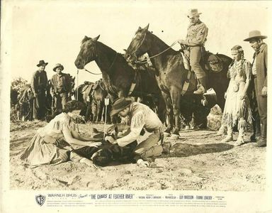 Guy Madison, Vera Miles, Onslow Stevens, and Helen Westcott in The Charge at Feather River (1953)