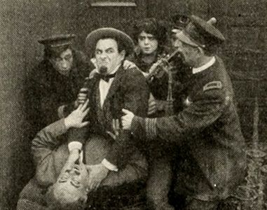 Dave Anderson, Charles Avery, Dot Farley, and Ford Sterling in The Man Next Door (1913)