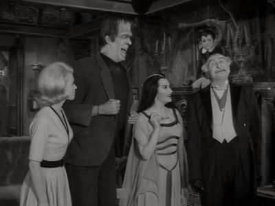 Yvonne De Carlo, Fred Gwynne, Al Lewis, Butch Patrick, and Pat Priest in The Munsters (1964)