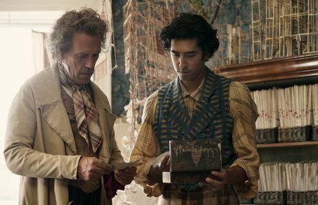 Hugh Laurie and Dev Patel in The Personal History of David Copperfield (2019)