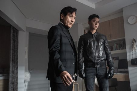 Sung-Ki Ahn and Park Seo-joon in The Divine Fury (2019)