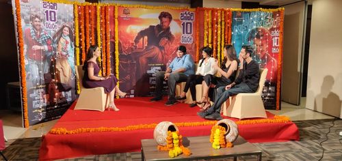 Anirudh Ravichander, Karthik Subbaraj, Malavika Mohanan, and Megha Akash at an event for Petta (2019)