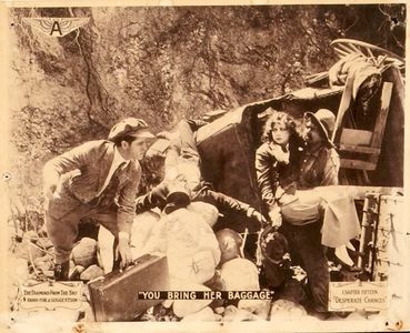 Charlotte Burton, Irving Cummings, and George Periolat in The Diamond from the Sky (1915)