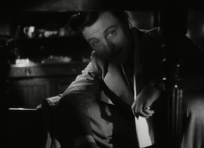 Georges Rollin in It Happened at the Inn (1943)