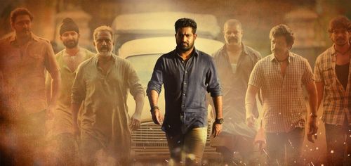 Banerjee, Brahmaji, N.T. Rama Rao Jr., Aravind, Ajay, and John Kokken in Janatha Garage (2016)