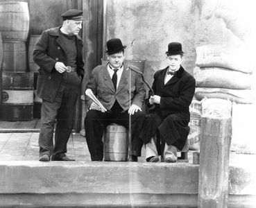 Oliver Hardy, Stan Laurel, and Walter Long in The Live Ghost (1934)