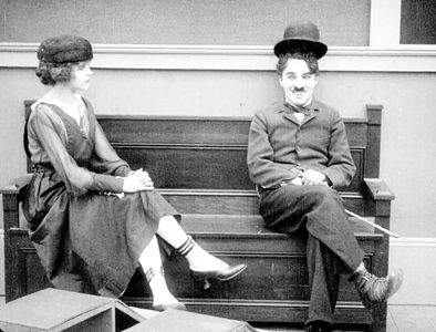 Charles Chaplin and Leota Bryan in The Rink (1916)