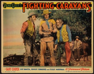 Gary Cooper, Tully Marshall, and Ernest Torrence in Fighting Caravans (1931)