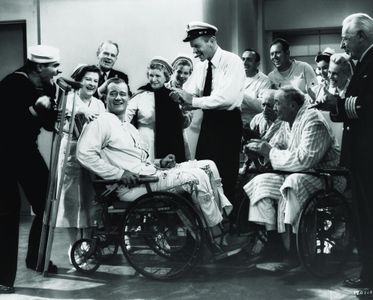 John Wayne, Tige Andrews, Dan Dailey, Louis Jean Heydt, Mae Marsh, and Henry O'Neill in The Wings of Eagles (1957)