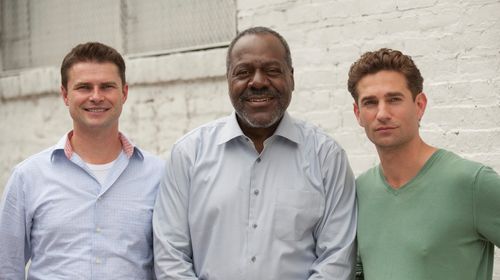 Producers Mark Kochanowicz and Benjamin Kanes with actor Frankie Faison, on the set of Assumption of Risk (2014)