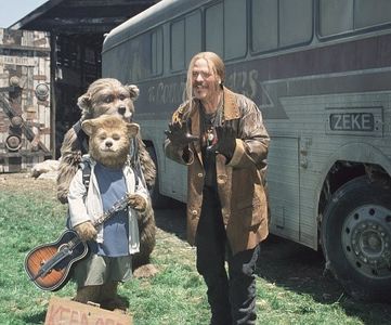 Beary (foreground, left) finds new friends in the Bears' manager, Henry (background left),and Roadie (M.C. Gainey, righ