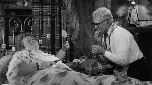 Rod Steiger and Ayllene Gibbons in The Loved One (1965)