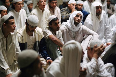 Amr Waked, Sonnell Dadral, and Mazhar Munir in Syriana (2005)