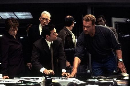 Arnold Schwarzenegger, Madison Mason, Bruce Ramsay, and Millie Slavin in Collateral Damage (2002)