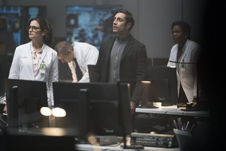 Riz Ahmed, Jenny Slate, and Sope Aluko in Venom (2018)