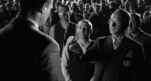 Liam Neeson, Ben Kingsley, and Ezra Dagan in Schindler's List (1993)