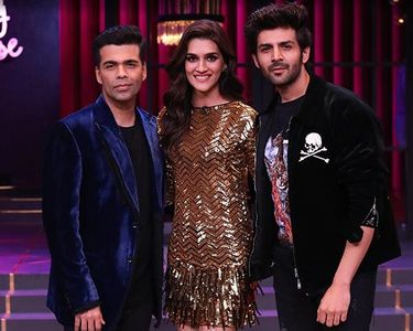 Karan Johar, Kartik Aaryan, and Kriti Sanon in Koffee with Karan (2004)