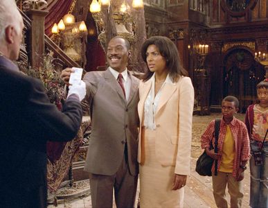 Eddie Murphy, Terence Stamp, Marc John Jefferies, Marsha Thomason, and Aree Davis in The Haunted Mansion (2003)