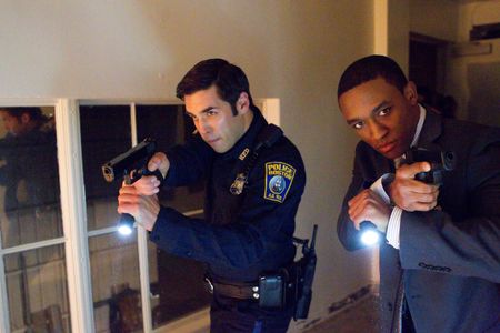 Jordan Bridges and Lee Thompson Young in Rizzoli & Isles (2010)