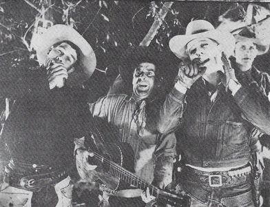 Hoot Gibson, Gilbert Holmes, and Glenn Strange in The Mounted Stranger (1930)