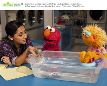 Leela, Elmo, Zoe, and Rocco, in Rocco's Boat