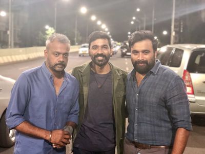 Gautham Vasudev Menon, Dhanush, and M. Sasikumar in Enai Noki Paayum Thota (2019)