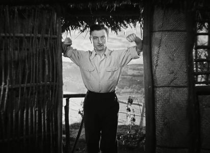 Georges Rollin in It Happened at the Inn (1943)