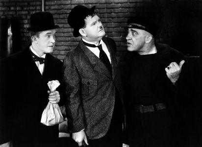 Oliver Hardy, Stan Laurel, and Walter Long in The Live Ghost (1934)