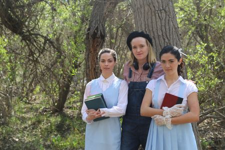 Caitlin Carver, Jaclyn Bethany and Isabelle Fuhrman on the set of 