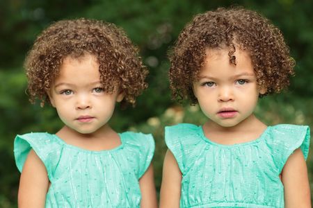 Alexandra with her identical twin sister Anna