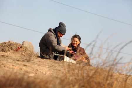 Mei Yong and Jingchun Wang in So Long, My Son (2019)