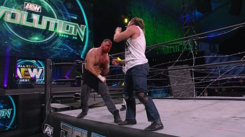 Kenny Omega and Jonathan Good in All Elite Wrestling: Revolution (2021)