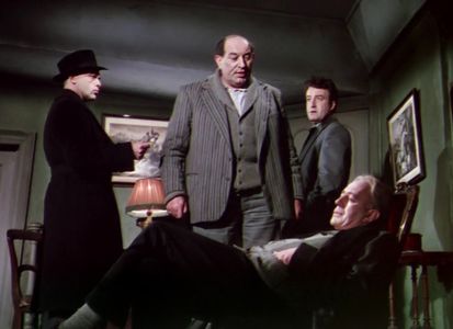 Alec Guinness, Peter Sellers, Herbert Lom, and Danny Green in The Ladykillers (1955)