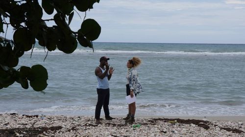 Kelley Kali and actor, Jimmy Jean-Louis discussing the upcoming scene in Jacmel, Haiti.