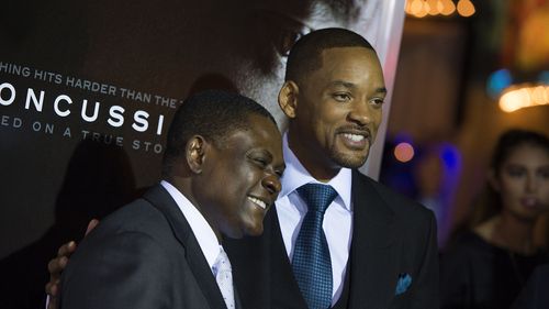 Will Smith and Bennet Omalu at an event for Concussion (2015)