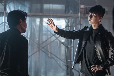 Sung-Ki Ahn and Park Seo-joon in The Divine Fury (2019)