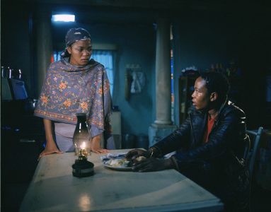 Terry Pheto and Presley Chweneyagae in Tsotsi (2005)