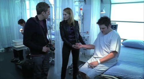 Marg Helgenberger, Eric Szmanda, and Jay DeMarcus in CSI: Crime Scene Investigation (2000)