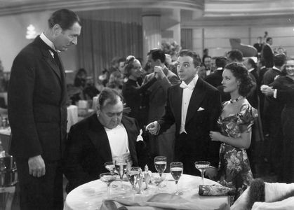 Lynn Bari, Bess Flowers, Jack Haley, Rochelle Hudson, Eugene Pallette, Larry Steers, and Arthur Treacher in She Had to E