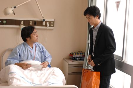 Teruyuki Kagawa and Masato Sakai in Key of Life (2012)