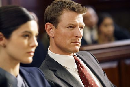 Philip Winchester and Monica Barbaro in Chicago Justice (2017)