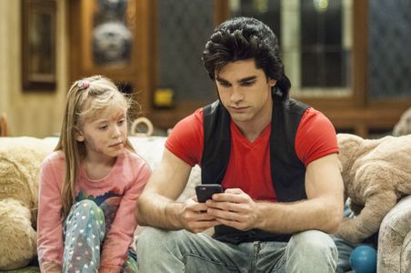 Justin Gaston and Dakota Guppy in The Unauthorized Full House Story (2015)